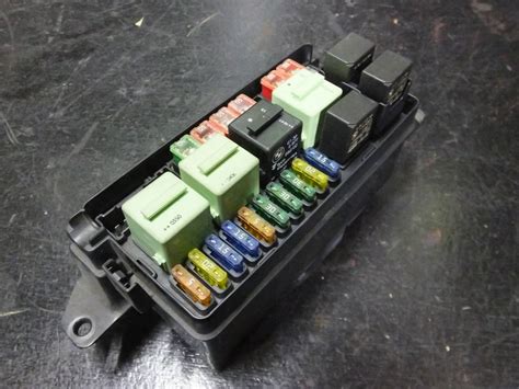 bmw battery junction box|BMW battery box with fuse.